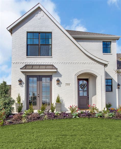 white brick tudor|tudor house exterior.